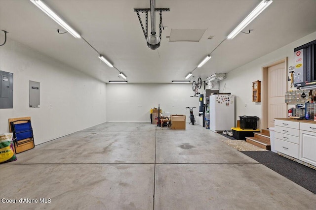 23815 N Rapalla Ct, Athol, ID 83801 - garage featuring electric panel and a workshop area