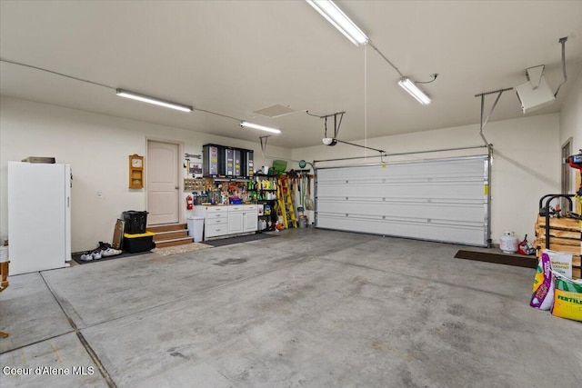 23815 N Rapalla Ct, Athol, ID 83801 - garage featuring a garage door opener