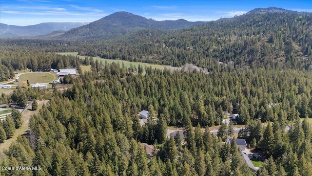 23815 N Rapalla Ct, Athol, ID 83801 - aerial view of property and surrounding area with a heavily wooded area and a mountain backdrop