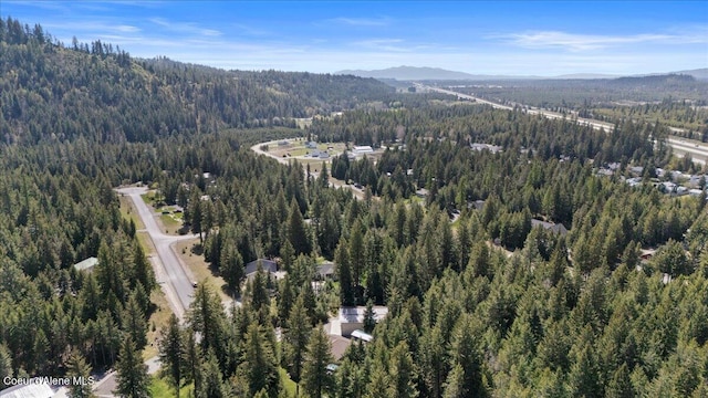 23815 N Rapalla Ct, Athol, ID 83801 - aerial view of property and surrounding area featuring a heavily wooded area and mountains
