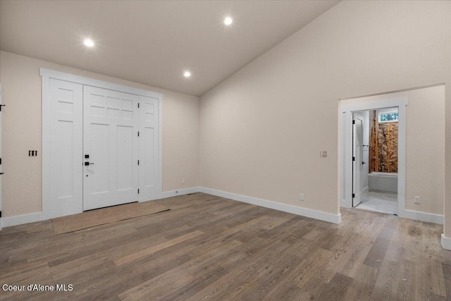 10233 Bunco Rd, Athol, ID 83801 - foyer entrance with wood finished floors, recessed lighting, baseboards, and high vaulted ceiling