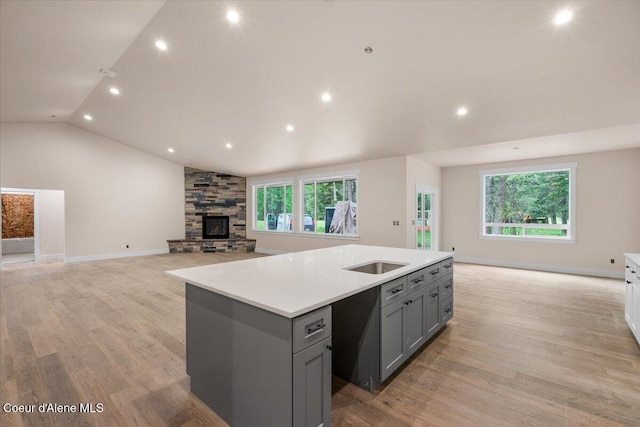10233 Bunco Rd, Athol, ID 83801 - kitchen with gray cabinetry, open floor plan, light countertops, plenty of natural light, and recessed lighting