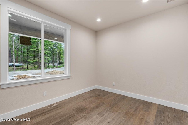 10233 Bunco Rd, Athol, ID 83801 - spare room featuring baseboards, wood finished floors, and recessed lighting