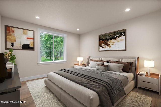 10233 Bunco Rd, Athol, ID 83801 - bedroom featuring baseboards, wood finished floors, and recessed lighting