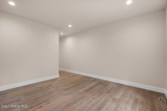 10233 Bunco Rd, Athol, ID 83801 - unfurnished room with recessed lighting, light wood-type flooring, and baseboards