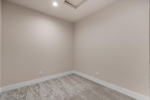 10233 Bunco Rd, Athol, ID 83801 - empty room featuring light colored carpet, baseboards, and recessed lighting