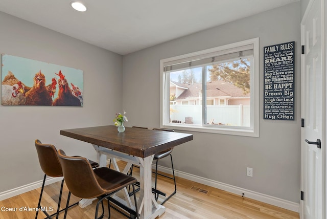 5030 E Frazier Dr, Post Falls, ID 83854 - dining room featuring baseboards and light wood-style flooring
