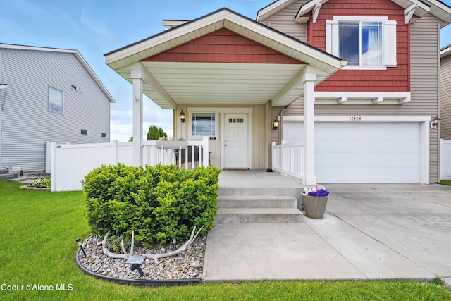 12404 W Devonshire Ave, Post Falls, ID 83854 - view of front of home with concrete driveway and an attached garage