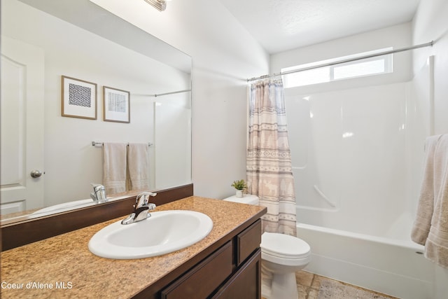 12404 W Devonshire Ave, Post Falls, ID 83854 - bathroom with vanity, shower / tub combo with curtain, and toilet