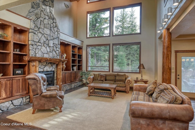 225 Fairway Dr, Priest Lake, ID 83856 - living area with a high ceiling and a fireplace
