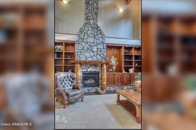 225 Fairway Dr, Priest Lake, ID 83856 - living room featuring a stone fireplace and built in features