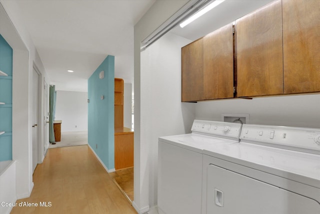 3012 N 4th St, Coeur Dalene, ID 83815 - laundry room featuring cabinet space, separate washer and dryer, light wood-style flooring, and recessed lighting