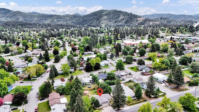 3012 N 4th St, Coeur Dalene, ID 83815 - aerial perspective of suburban area with a mountainous background