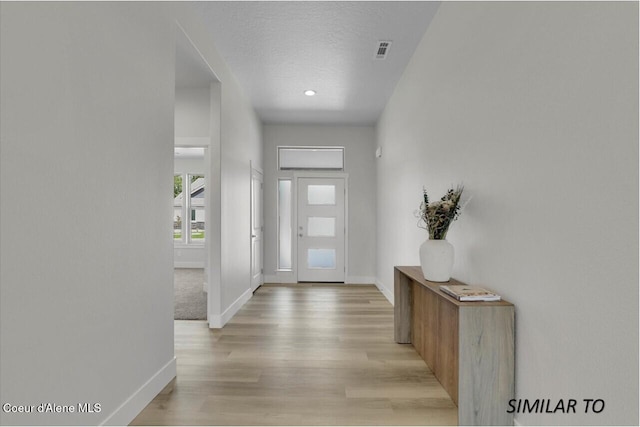 1109 N Country Club Dr Unit 22, Deer Park, WA 99006 - entrance foyer featuring baseboards and light wood-style floors