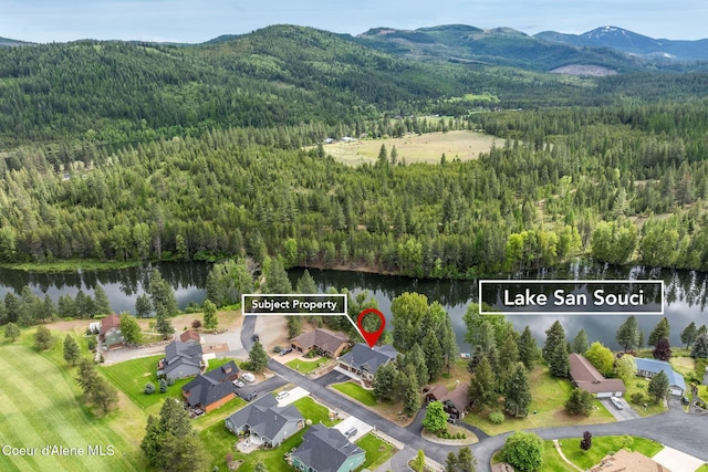 396 Hanaford Rd, Blanchard, ID 83804 - drone / aerial view of a heavily wooded area and a water and mountain view