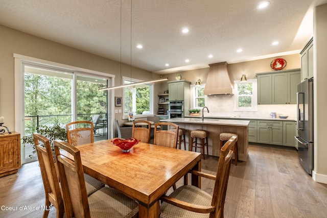 396 Hanaford Rd, Blanchard, ID 83804 - dining area with recessed lighting, light wood finished floors, a textured ceiling, and healthy amount of natural light