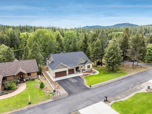 396 Hanaford Rd, Blanchard, ID 83804 - view from above of property featuring a heavily wooded area and a mountain backdrop