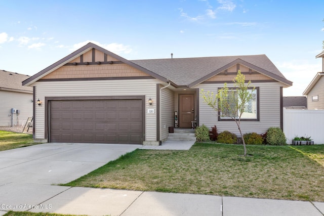 3283 N Knob Creek Ct, Post Falls, ID 83854 - single story home with a garage, concrete driveway, and roof with shingles