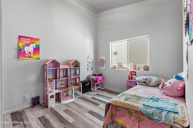 3283 N Knob Creek Ct, Post Falls, ID 83854 - bedroom with wood finished floors and baseboards