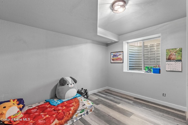 3283 N Knob Creek Ct, Post Falls, ID 83854 - bedroom with wood finished floors and baseboards