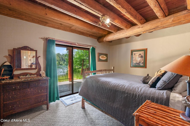 8457 N Powell Way, Hayden, ID 83835 - carpeted bedroom featuring wood ceiling with exposed beams and access to outside