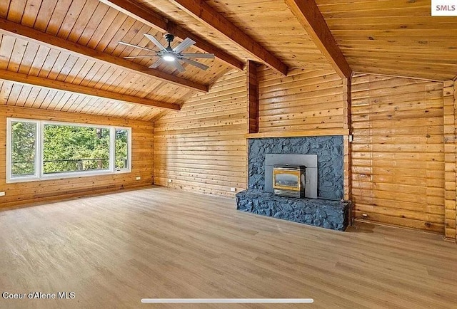 31961 N 3rd Ave, Spirit Lake, ID 83869 - unfurnished living room with wood finished floors, wood ceiling, a ceiling fan, wooden walls, and a fireplace