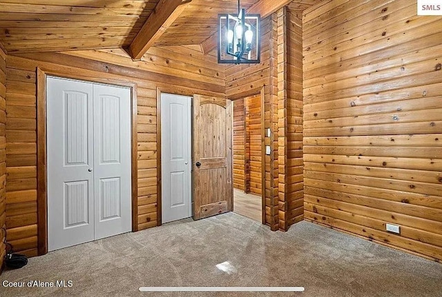 31961 N 3rd Ave, Spirit Lake, ID 83869 - unfurnished bedroom with carpet floors, wooden ceiling, and rustic walls