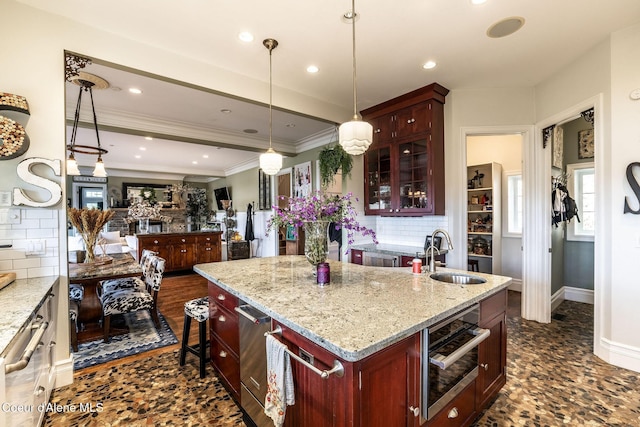 4878 E Annapolis Ct, Coeur Dalene, ID 83814 - kitchen with a sink, tasteful backsplash, stainless steel oven, reddish brown cabinets, and ornamental molding