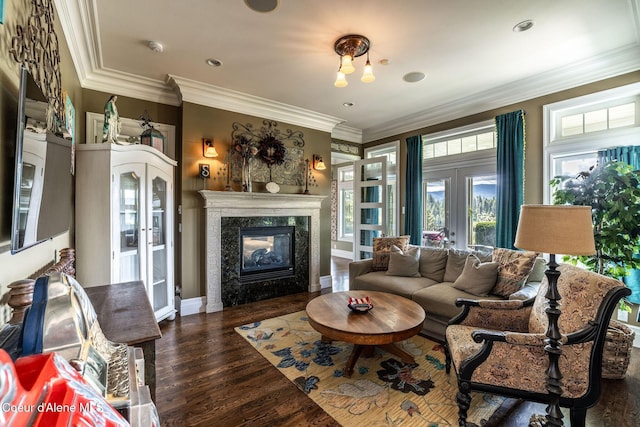 4878 E Annapolis Ct, Coeur Dalene, ID 83814 - living area featuring wood finished floors, crown molding, french doors, and a fireplace