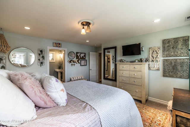 4878 E Annapolis Ct, Coeur Dalene, ID 83814 - carpeted bedroom featuring baseboards, recessed lighting, and ensuite bathroom