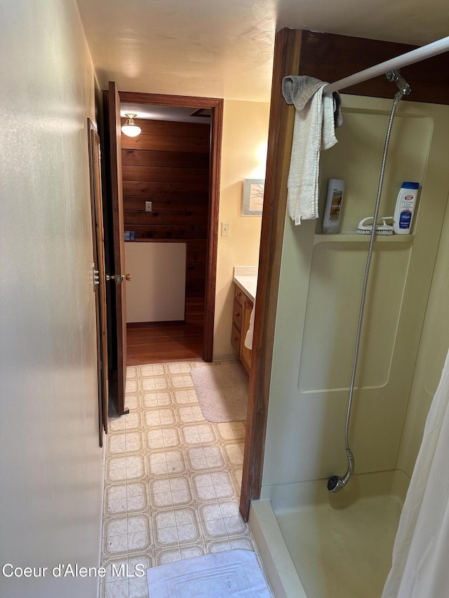 366 Yukon Rd, Bonners Ferry, ID 83805 - bathroom featuring tile patterned floors, a shower with shower curtain, and vanity