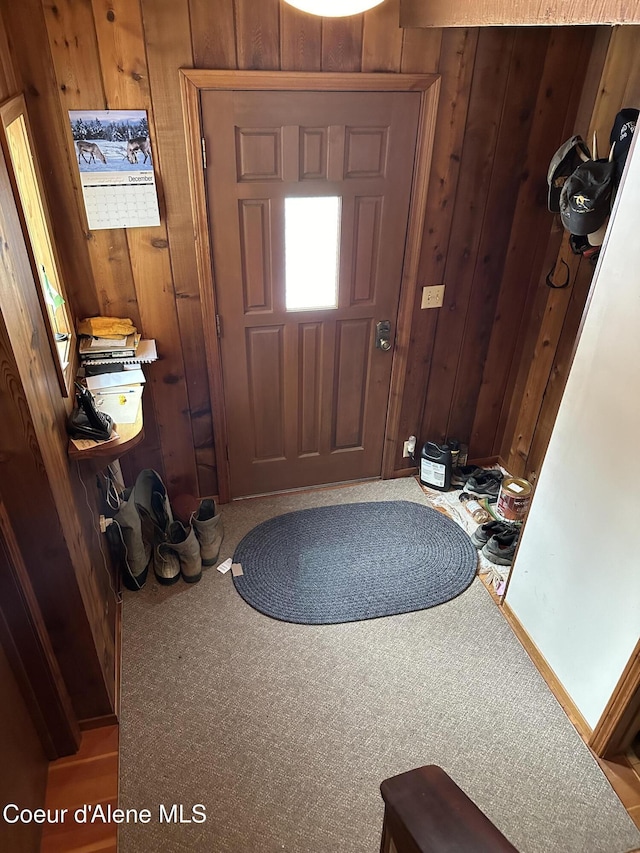 366 Yukon Rd, Bonners Ferry, ID 83805 - carpeted entryway with wooden walls