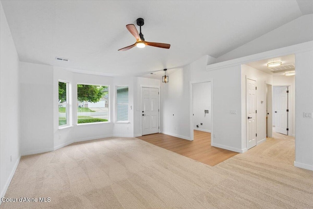 1374 W Timor Ave, Coeur Dalene, ID 83815 - spare room featuring carpet flooring, a ceiling fan, baseboards, and lofted ceiling