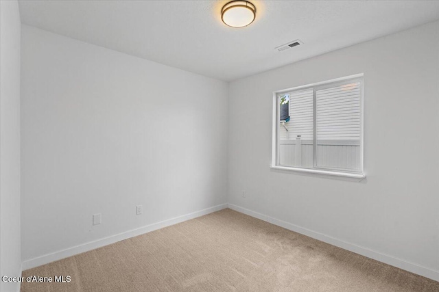 1374 W Timor Ave, Coeur Dalene, ID 83815 - carpeted empty room with baseboards