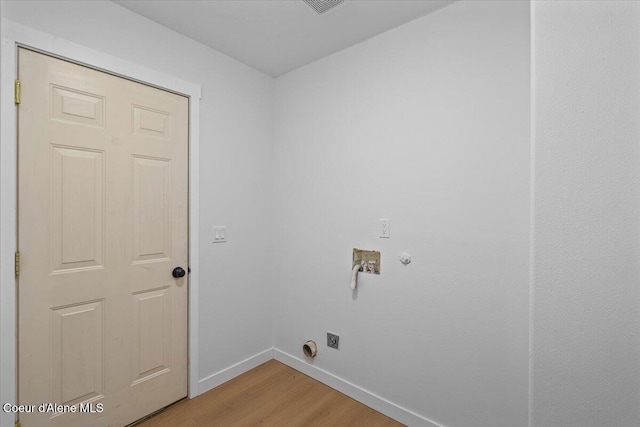 1374 W Timor Ave, Coeur Dalene, ID 83815 - laundry area featuring baseboards, light wood-style floors, washer hookup, and hookup for an electric dryer