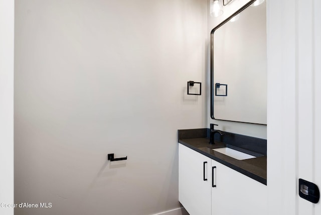 1682 Onyx Ct 1670, 1674 1678, Sandpoint, ID 83864 - bathroom featuring vanity and baseboards