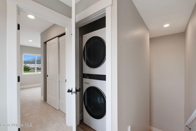 1682 Onyx Ct 1670, 1674 1678, Sandpoint, ID 83864 - washroom featuring stacked washer / drying machine, carpet floors, baseboards, and recessed lighting