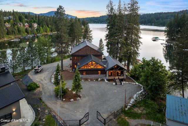 14318 N Waters Edge Ct, Hayden, ID 83835 - view from above of property featuring a forest and a water and mountain view