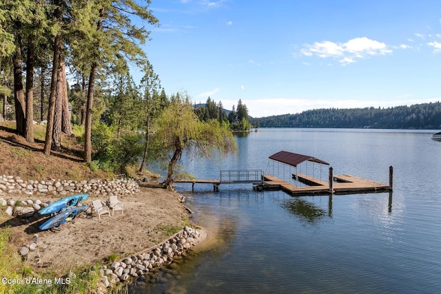 14318 N Waters Edge Ct, Hayden, ID 83835 - dock area featuring a water view and a wooded view