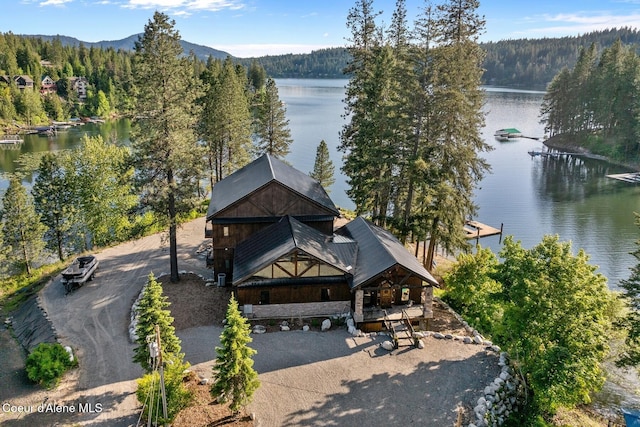 14318 N Waters Edge Ct, Hayden, ID 83835 - view from above of property with a forest and a water and mountain view