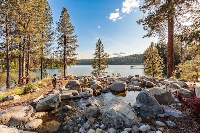 14318 N Waters Edge Ct, Hayden, ID 83835 - water view featuring a heavily wooded area