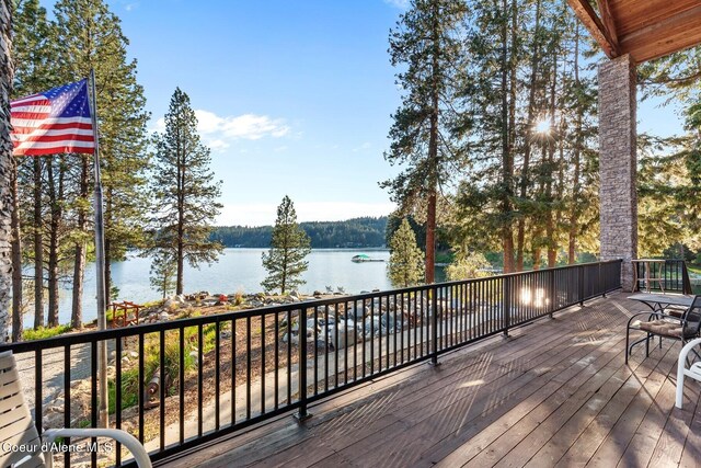 14318 N Waters Edge Ct, Hayden, ID 83835 - wooden terrace with a water view