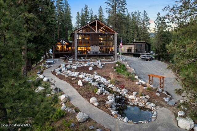 14318 N Waters Edge Ct, Hayden, ID 83835 - view of yard featuring a wooden deck