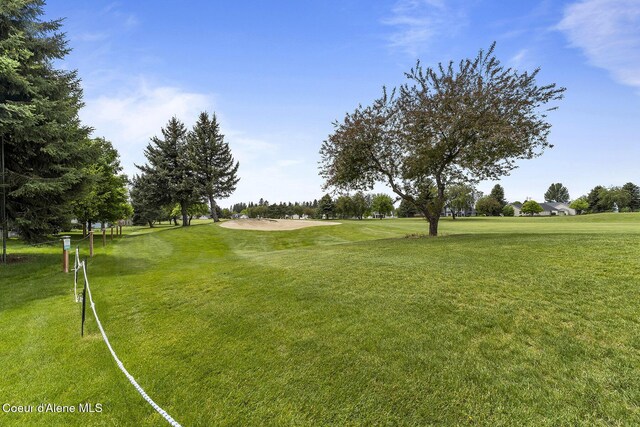 3025 N Sand Trap Way, Post Falls, ID 83854 - view of property's community with golf course view and a lawn