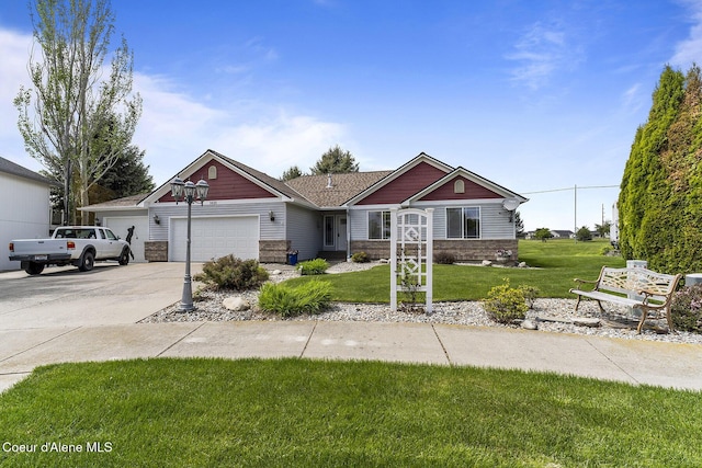 3025 N Sand Trap Way, Post Falls, ID 83854 - view of front facade with a garage, a front yard, and concrete driveway