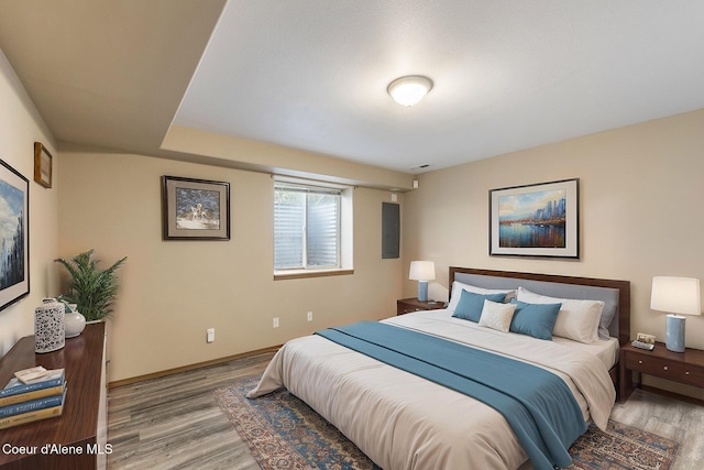3025 N Sand Trap Way, Post Falls, ID 83854 - bedroom with wood finished floors and baseboards