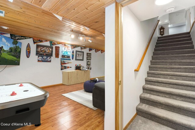 3025 N Sand Trap Way, Post Falls, ID 83854 - rec room featuring wood ceiling, baseboards, and wood finished floors