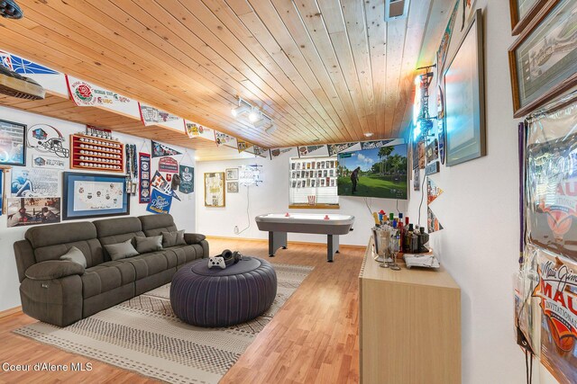 3025 N Sand Trap Way, Post Falls, ID 83854 - living area with wood finished floors, wood ceiling, and billiards table