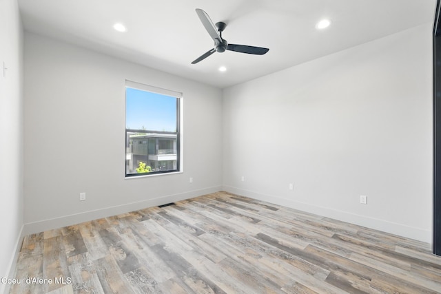 2888 W Lumber Ln, Coeur Dalene, ID 83814 - unfurnished room with a ceiling fan, recessed lighting, light wood-style floors, and baseboards