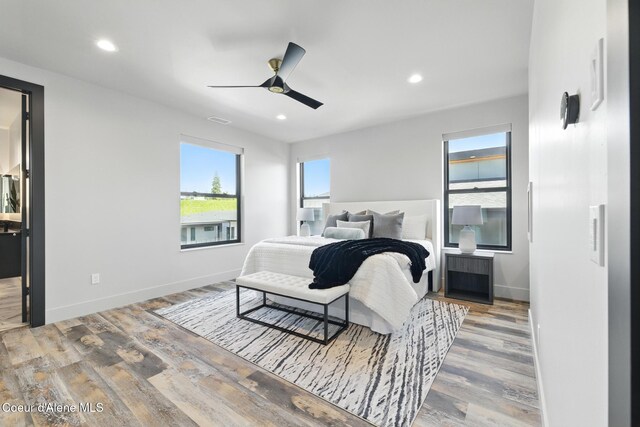2888 W Lumber Ln, Coeur Dalene, ID 83814 - bedroom featuring wood finished floors, baseboards, recessed lighting, and a ceiling fan